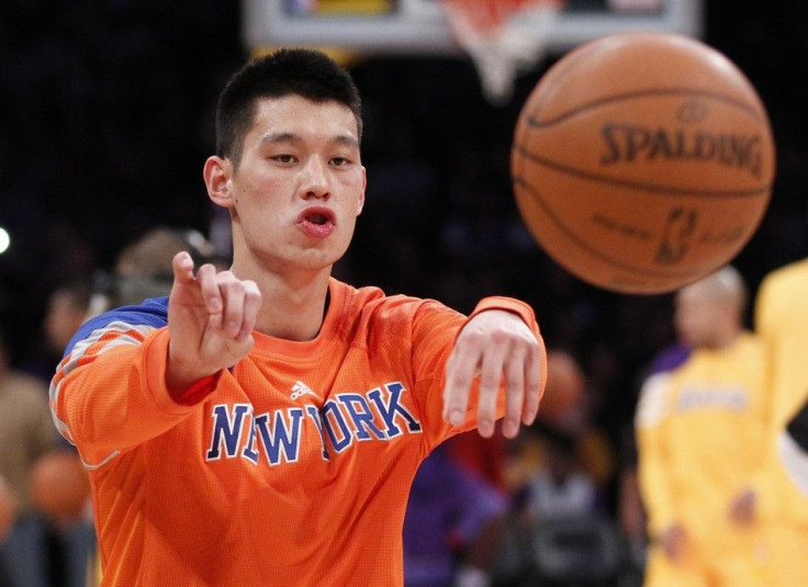 Newly acquired New York Knicks guard Jeremy Lin passes the ball during warm-ups before the NBA basketball game against the Los Angeles Lakers in Los Angeles