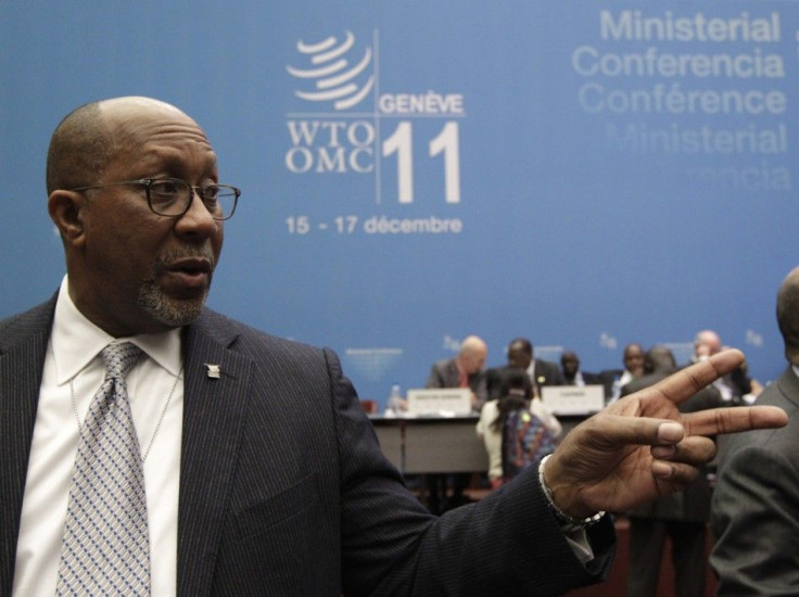 US Trade Representative Kirk gestures before the opening of the 8th World Trade Organization Ministerial Conference in Geneva