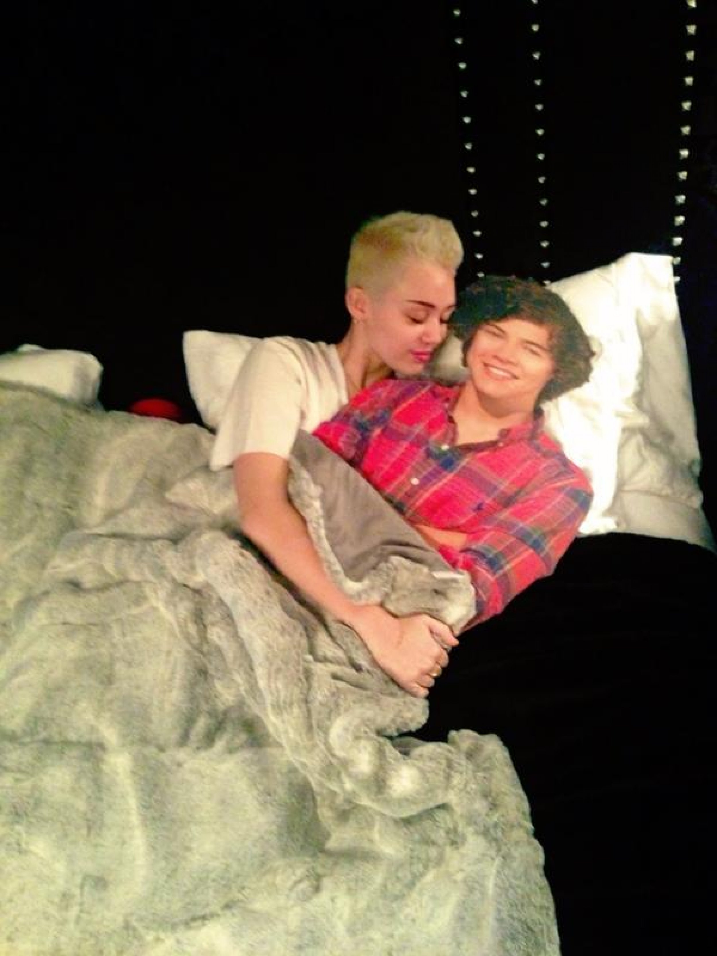 Miley Cyrus Takes Photos In Bed With Harry Styles Of One Direction
