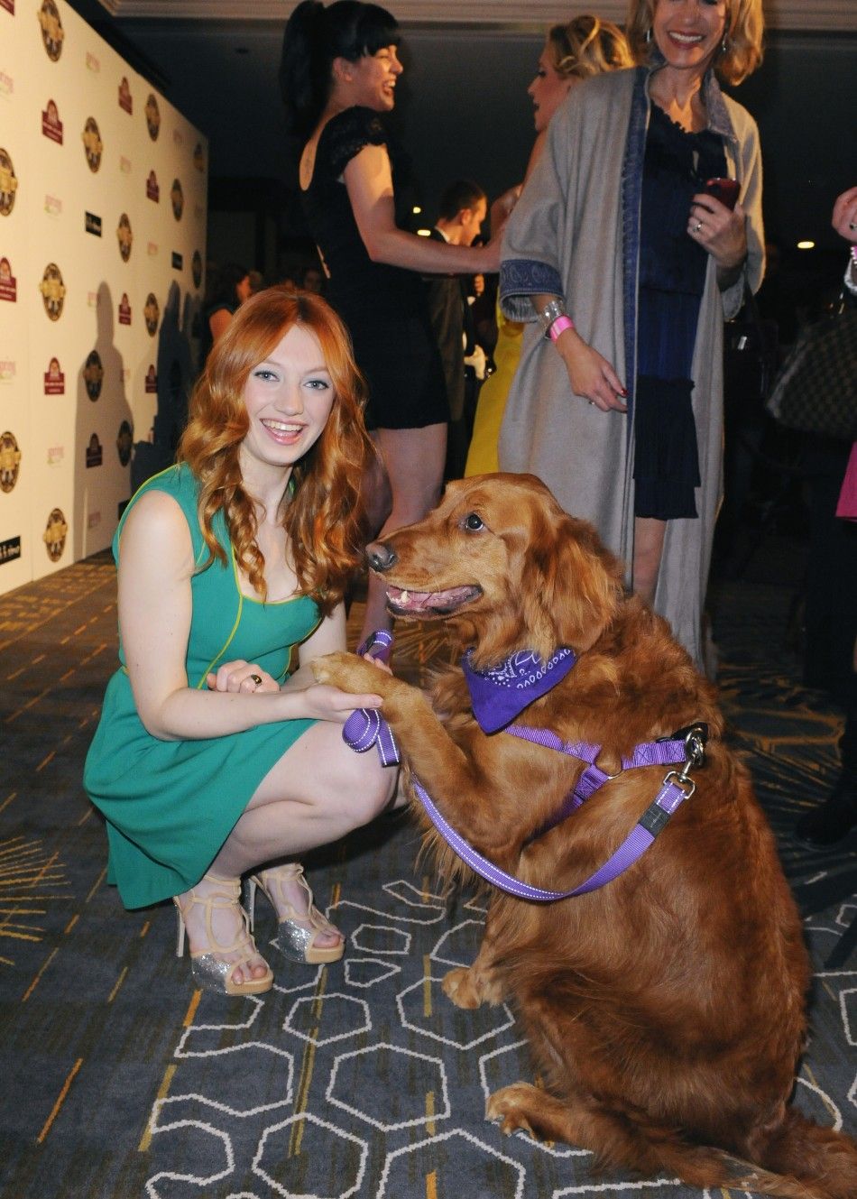 Actress Jacqueline Emerson and her dog Ginger arrive at the first annual Golden Collar Awards celebrating Hollywoods most talented canine thespians from Oscar nominated films and Emmy Award winning television shows in Los Angeles, California 