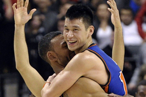 Jeremy Lin celebrates with his teammate after hitting the game winner against Toronto.