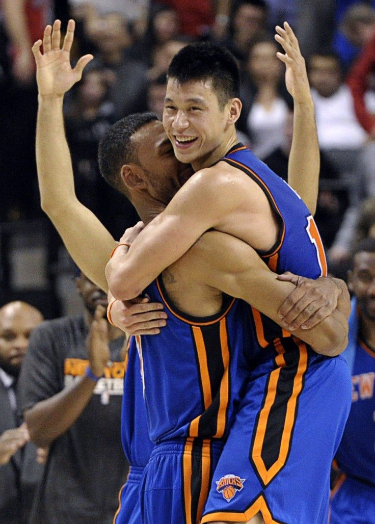 Jeremy Lin celebrates with his teammate after hitting the game winner against Toronto.