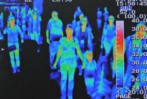 A thermal scanner shows the heat signature of passengers from an international flight arriving at Incheon airport, west of Seoul, April 28, 2009.