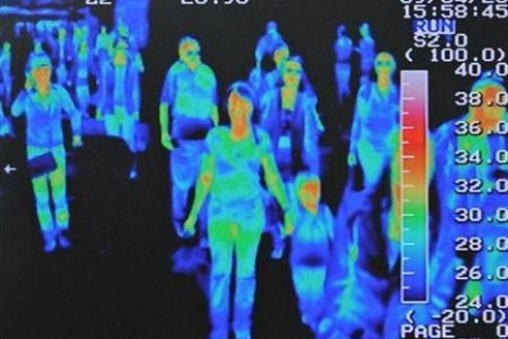 A thermal scanner shows the heat signature of passengers from an international flight arriving at Incheon airport, west of Seoul, April 28, 2009.