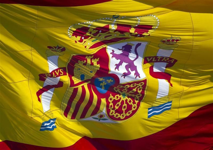 A Spanish flag flies in Madrid&#039;s Plaza Colon