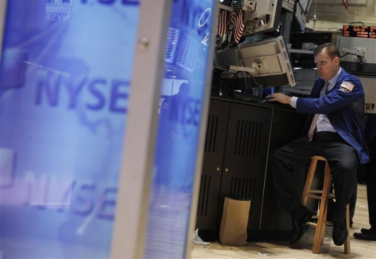 A trader works on the floor of the New York Stock Exchange in New York