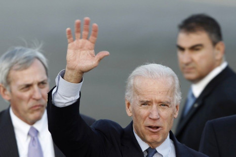 U.S. Vice President Joe Biden waves during his arrival at the Athens Eleftherios Venizelos airport in Athens