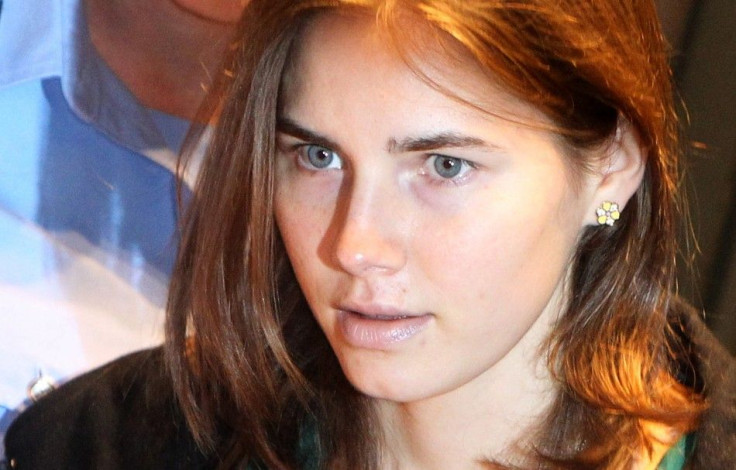 Amanda Knox--shown here arriving in court for her appeal trial session in Perugia, Italy, in October last year--signed a book deal with HarperCollins today