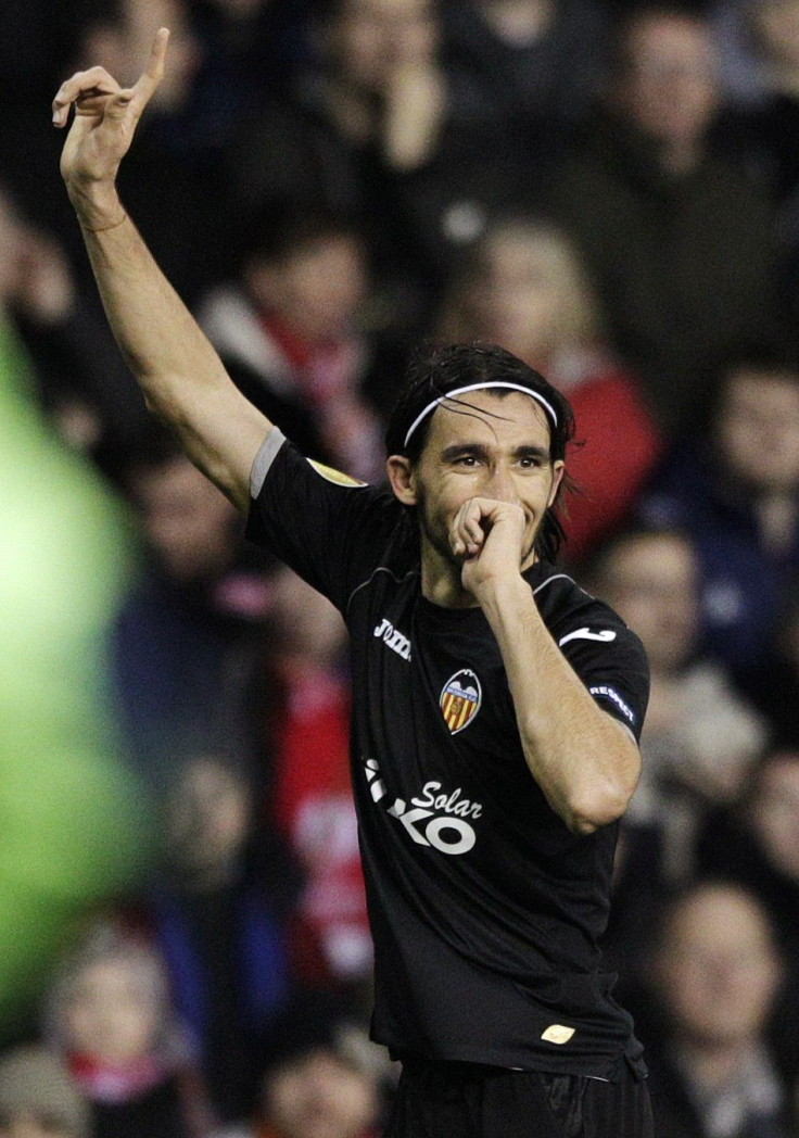 Valencia&#039;s Mehmet Topal celebrates his goal against Stoke City during their Europa League soccer match in Stoke
