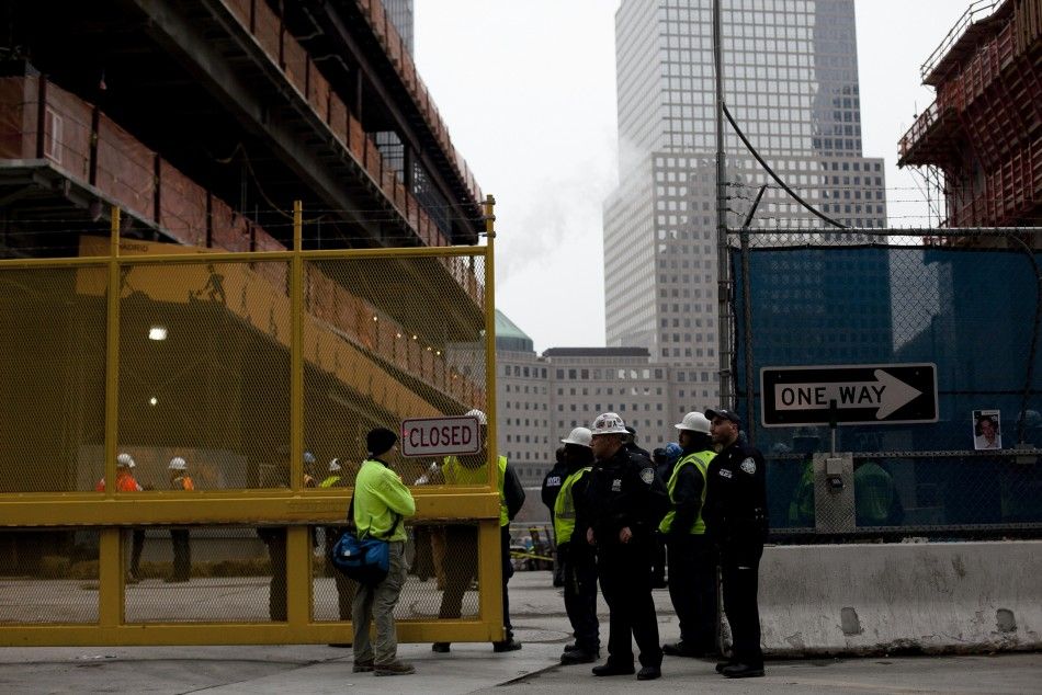 Police officers stand at the World Trade Center construction site in New York