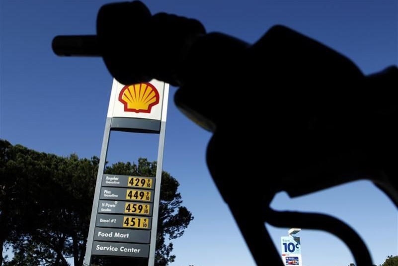 Gasoline prices are shown at a gas station in Del Mar, California