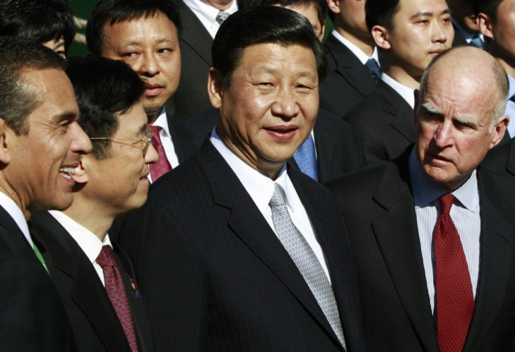 Los Angeles Mayor Villaraigosa, China Shipping Chairman Shaode, Chinese Vice President Jinping and California Governor Brown talk during a visit to the Port of Los Angeles in San Pedro