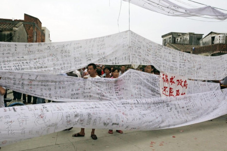 Villagers from Wukan collect signatures in support for a protest in Lufeng in the southern Chinese Guangdong province.