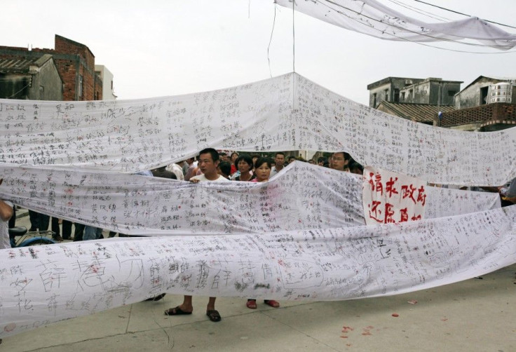 Villagers from Wukan collect signatures in support for a protest in Lufeng in the southern Chinese Guangdong province.