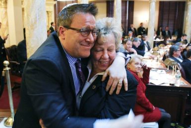Steven Goldstein (L), chairman and CEO of Garden State Equality, reacts with the bills sponsor New Jersey Senate Majority Leader Senator Loretta Weinberg after the New Jersey State Senate passed the &quot;Marriage Equality and Religious Exemption Act&quot