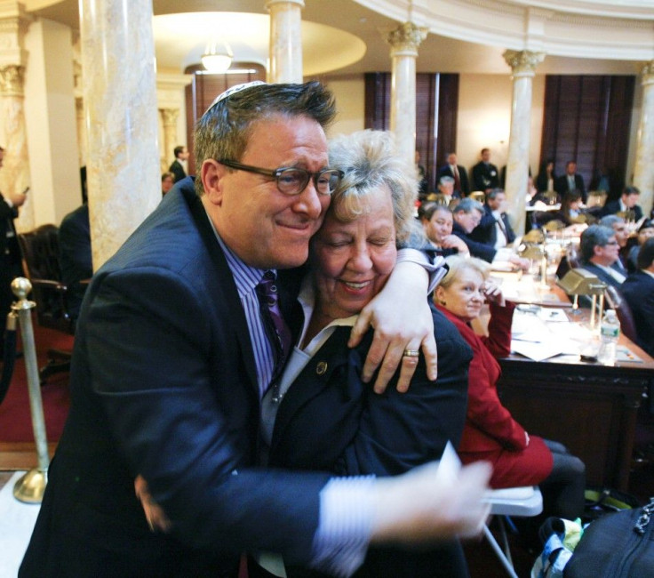Steven Goldstein (L), chairman and CEO of Garden State Equality, reacts with the bills sponsor New Jersey Senate Majority Leader Senator Loretta Weinberg after the New Jersey State Senate passed the &quot;Marriage Equality and Religious Exemption Act&quot