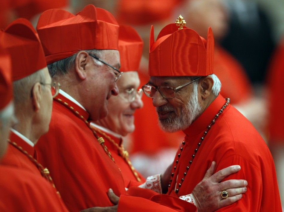 New Cardinal George Alencherry R of India talks with Cardinal Timothy Dolan R of the U.S. during a consistory ceremony in Saint Peter039s Basilica