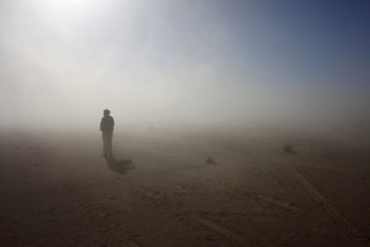 A Sahrawi man stands in the Sahara desert between Tindouf and Tifariti, February 26, 2011.