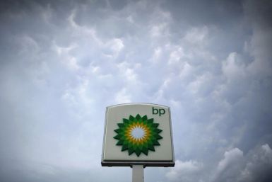 Storm clouds form near a BP station in Alexandria, Virginia July 19, 2010.