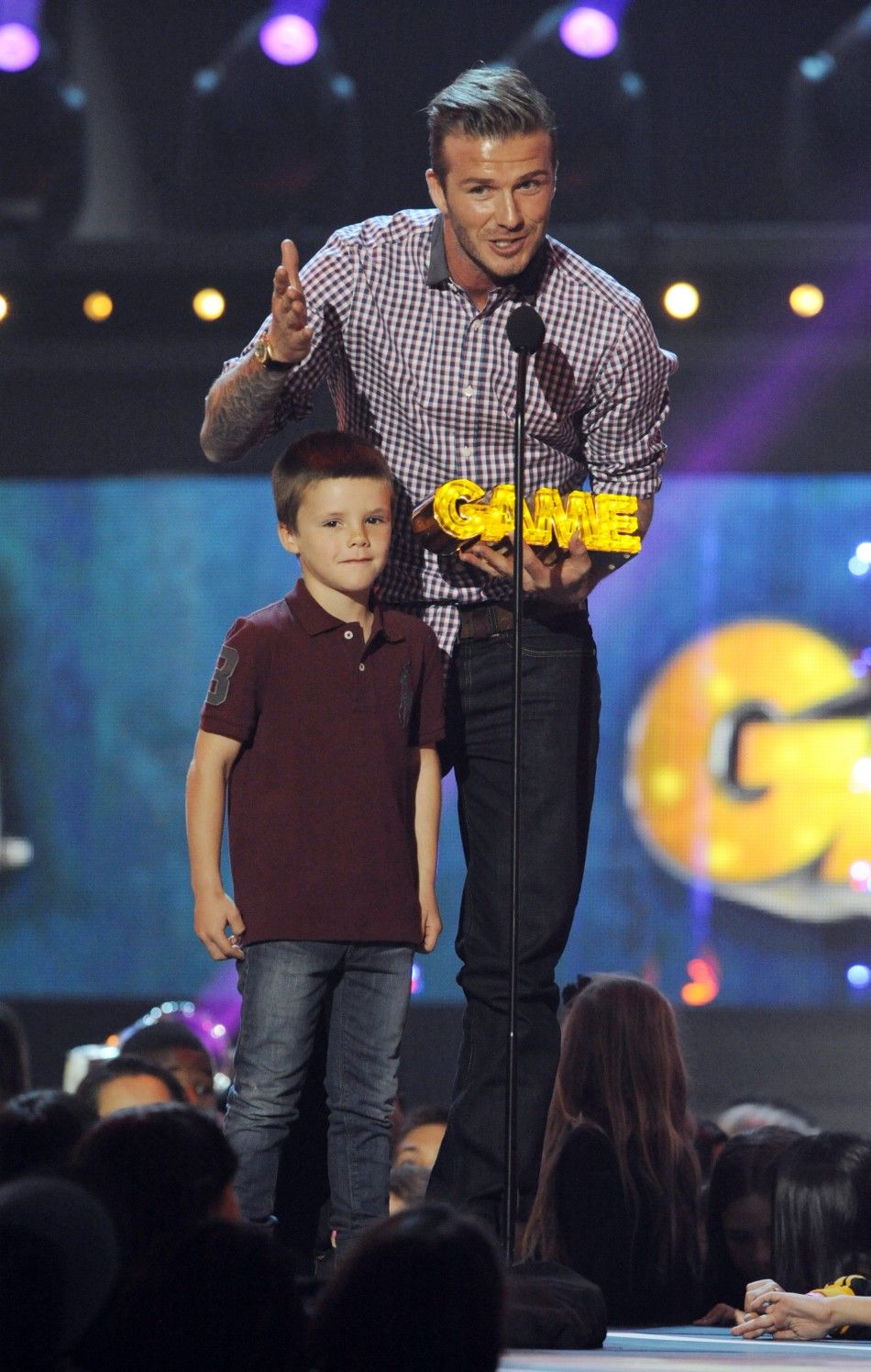 David Beckham with his son Cruz accepts the Thats How I Roll award 