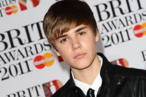 Justin Bieber wins the International Breakthough Act Brit Award 2011 at the O2 in London.