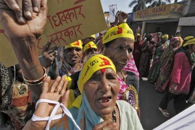 Local activists attend a demonstration to mark the 25th anniversary of the Bhopal gas disaster in Bhopal