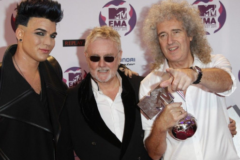 Adam Lambert poses after performing with Roger Taylor and Brian May of Queen at the MTV Europe Music Awards