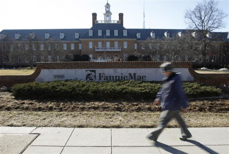 A woman walks past the Fannie Mae headquarters in Washington