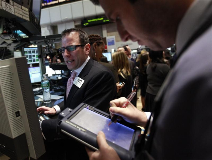 Traders work on the floor of the New York Stock Exchange