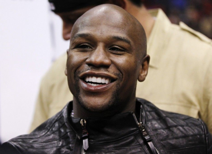Floyd Mayweather, dubbed &quot;racist&quot; by UFC president Dana White, following comments the boxing champion made regarding Jeremy Lin and Manny Pacquiao