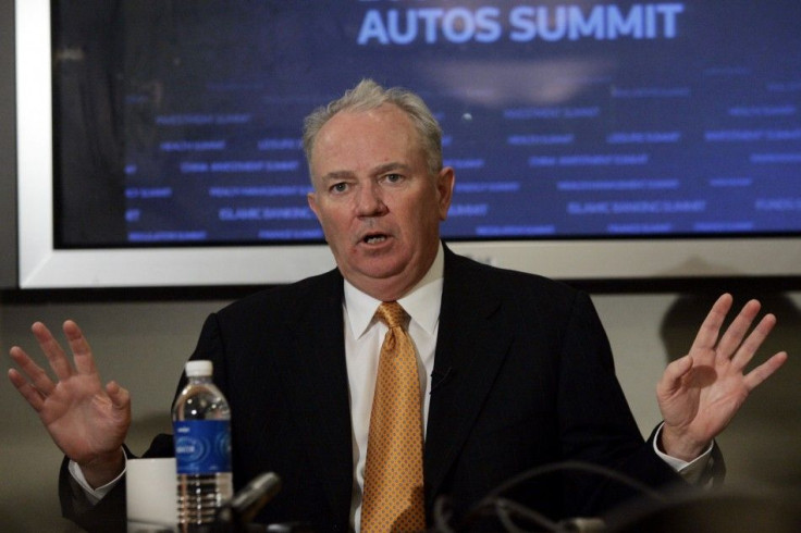 AutoNation CEO Mike Jackson talks with Reuters reporters during the Reuters Autos Summit in Detroit, Michigan