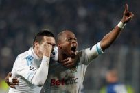 Olympic Marseille&#039;s Andre Ayew celebrates after scoring against Inter Milan during their Champions League soccer match at the Stade Vélodrome in Marseille