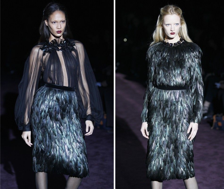 Models present creations from Guccis 2012 AutumnWinter collection during Milan Fashion Week in Milan February 22, 2012.