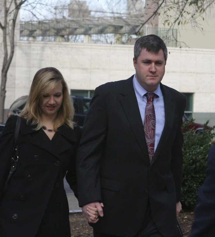 Gabe Watson arrives with his wife Kim for the fifth day of his capital murder trial at the Mel Bailey Criminal Justice Center in Birmingham, Alabama