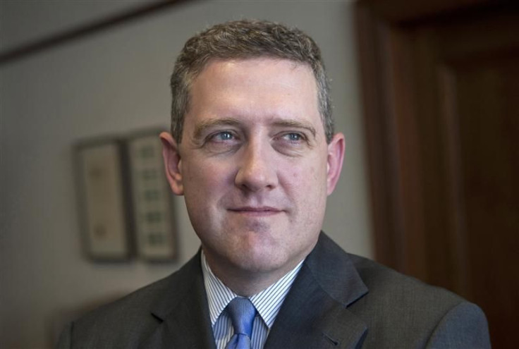 President and CEO of the Federal Reserve Bank of St. Louis James Bullard poses during an interview at the Federal Reserve Bank of St. Louis