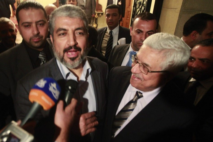 Hamas leader Meshaal and Palestinian President Abbas speak to the media after their meeting in Cairo
