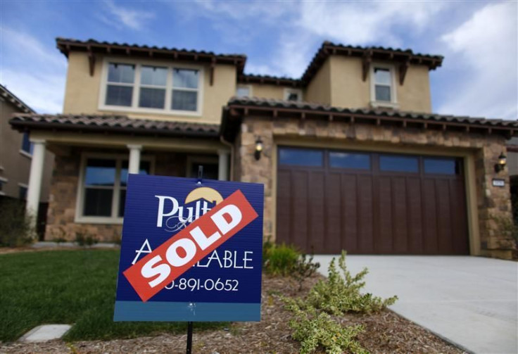 A newly built home is shown as sold in a subdivision under construction in Carlsbad