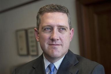 President and CEO of the Federal Reserve Bank of St. Louis James Bullard poses during an interview at the Federal Reserve Bank of St. Louis