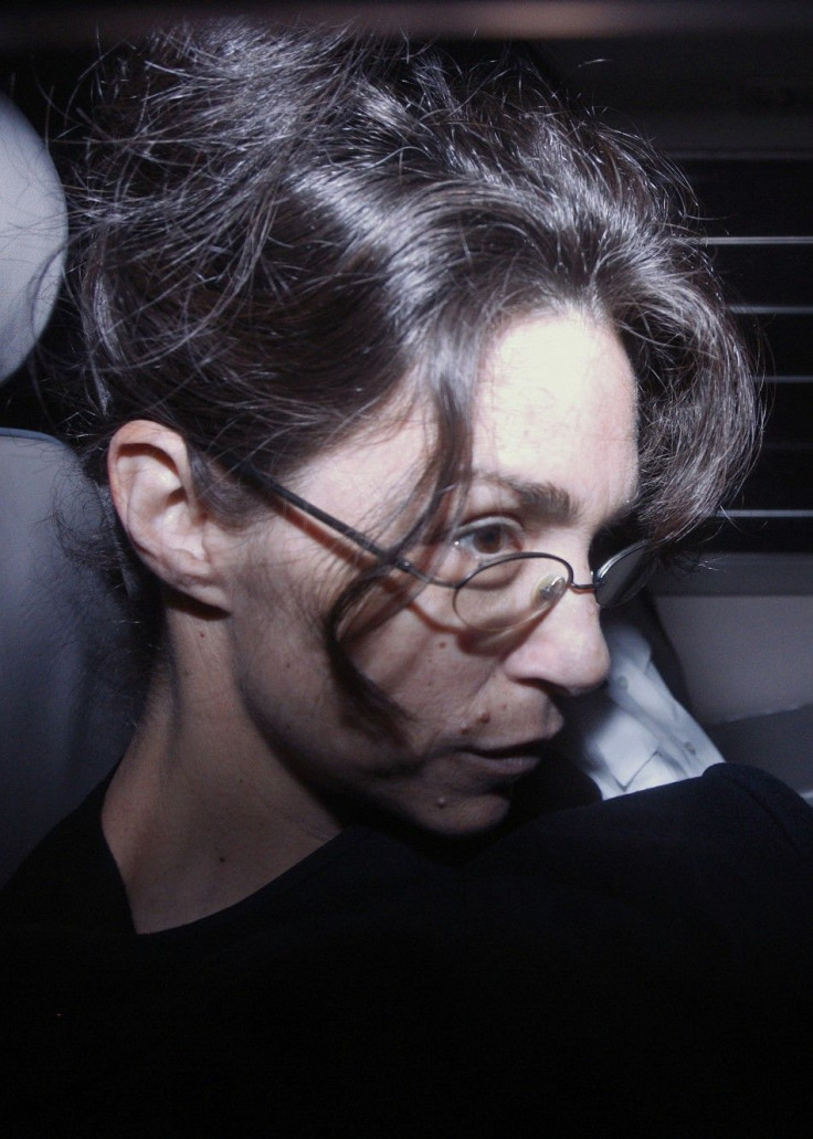 Nancy Kissel, dubbed the &quot;milkshake&quot; murderess, sits in a prison van as she arrives at the Court of Final Appeal in Hong Kong
