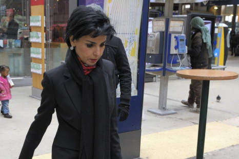 Former French Justice Minister Rachida Dati walks in the Gare du Nord train station to take a train for Lille.