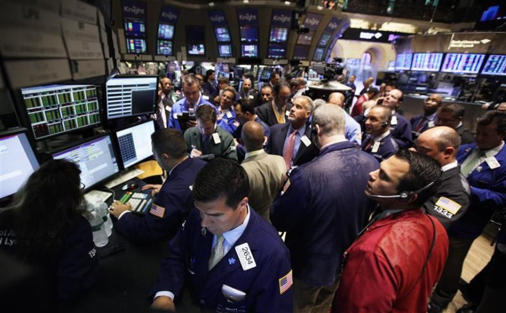 Traders work on the floor of the New York Stock Exchange