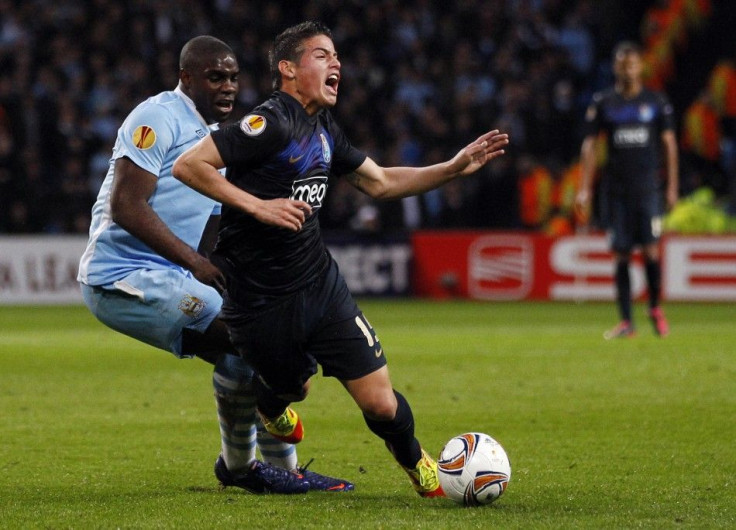 Porto&#039;s James Rodriguez, a reported target for Manchester United, is challenged by Manchester City&#039;s Micah Richards during the sides&#039; Europa League meeting at the Etihad Stadium