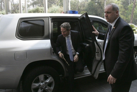 U.S. Treasury Secretary Timothy Geithner (C) arrives at a meeting of Group of 20 finance ministers and central bankers in Mexico City February 25, 2012.