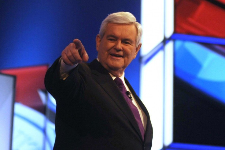 Republican U.S. presidential candidate Newt Gingrich points before the start of the presidential debate in Mesa, Arizona, February 22, 2012.