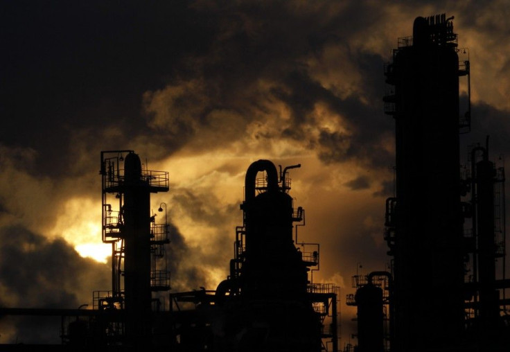 Steam is emitted from an oil refinery in Yokohama, south of Tokyo January 26, 2011.