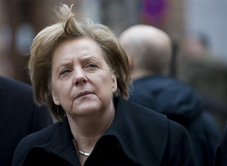 German Chancellor Merkel looks around during guided walking tour of northern German city of Stralsund