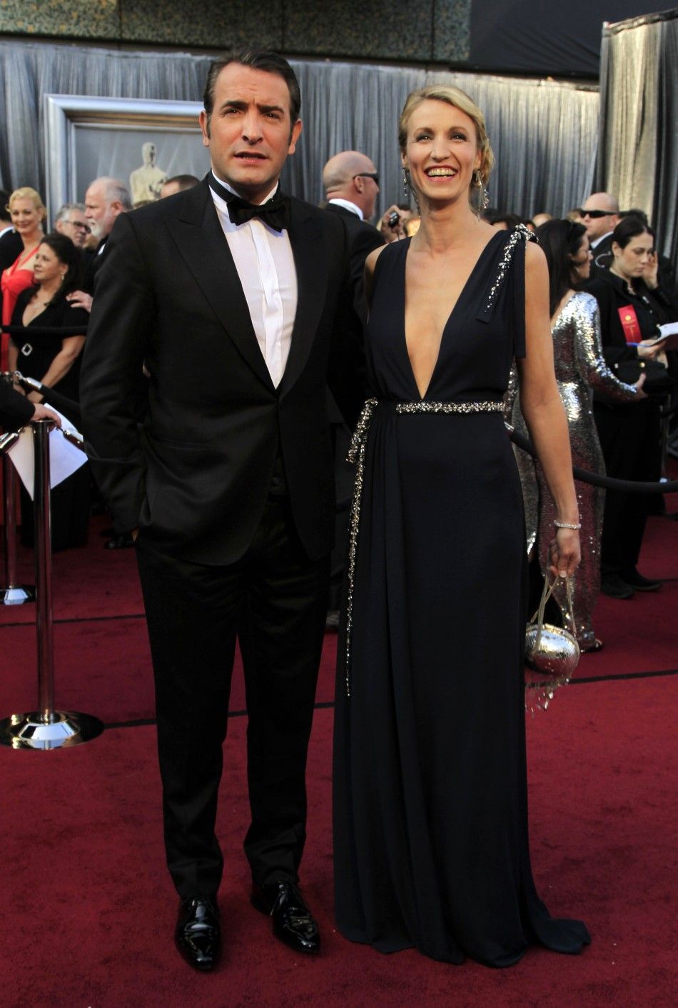 French actor Jean Dujardin, best actor nominee for his role in quotThe Artistquot, and his wife Alexandra Lamy arrive at the 84th Academy Awards in Hollywood