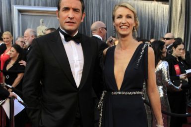 French actor Jean Dujardin, best actor nominee for his role in &quot;The Artist&quot;, and his wife Alexandra Lamy arrive at the 84th Academy Awards in Hollywood