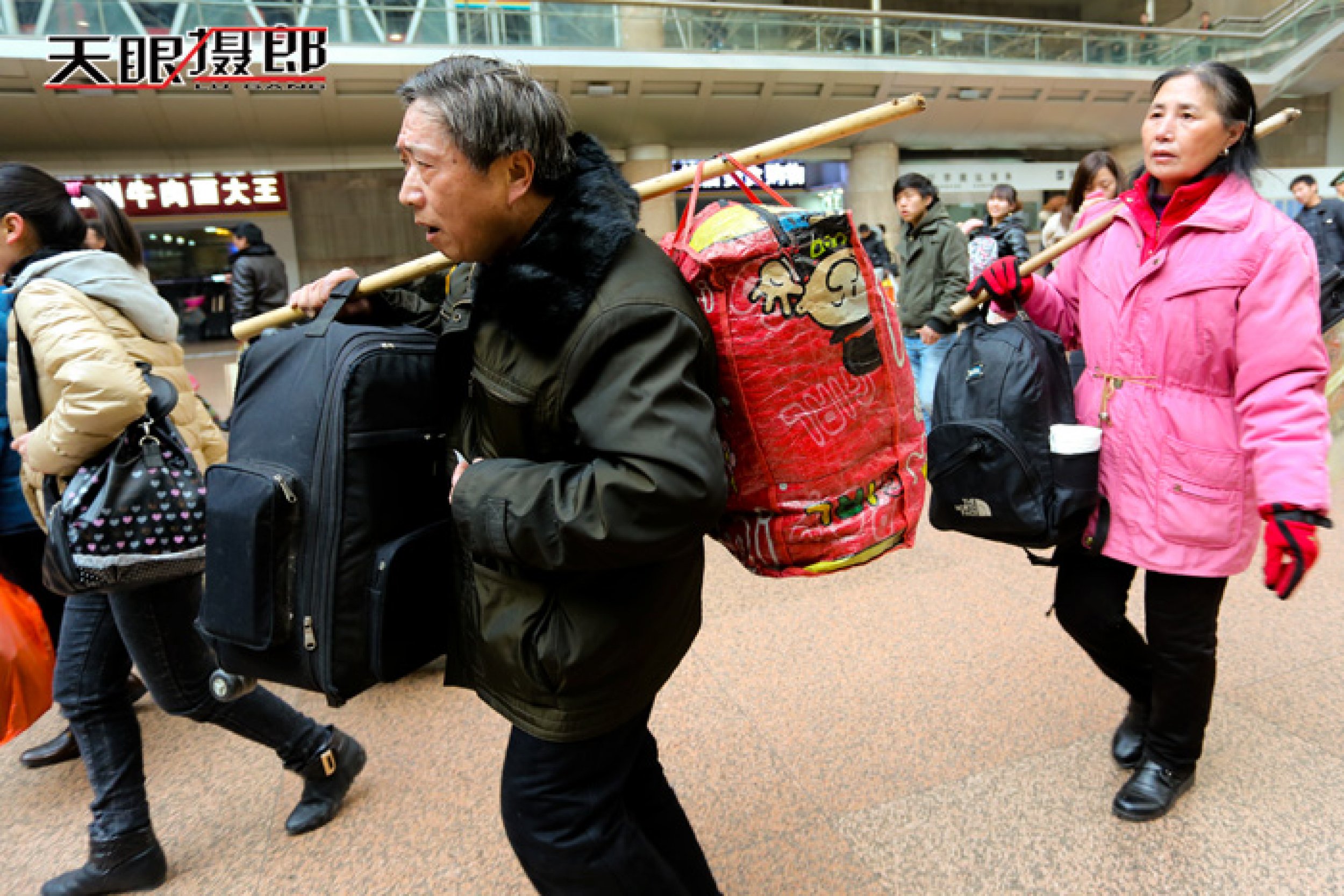 Travelers carry large bags