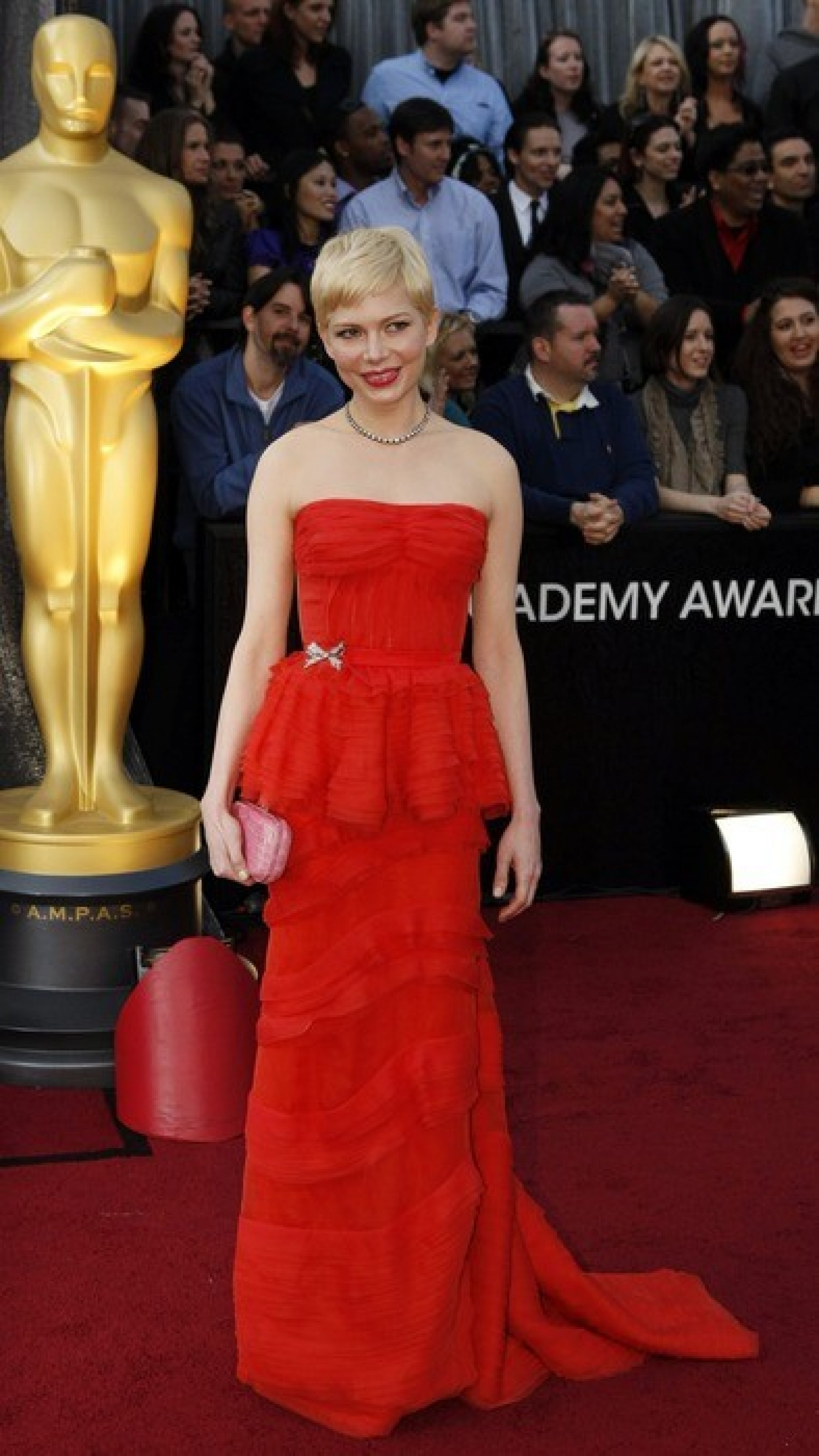 Michelle Williams, best actress nominee for her role in quotMy Week with Marilynquot, arrives on the red carpet at the 84th Academy Awards in Hollywood, California, February 26, 2012.